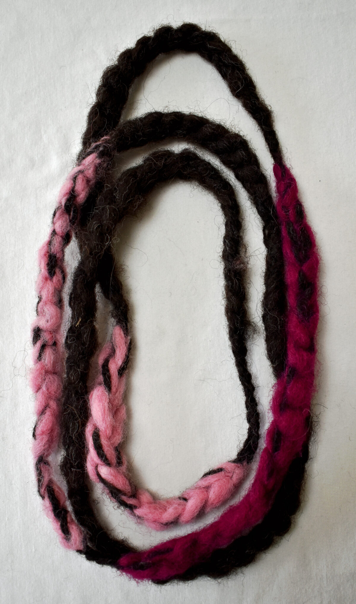dark brown and pink crocheted wool necklace